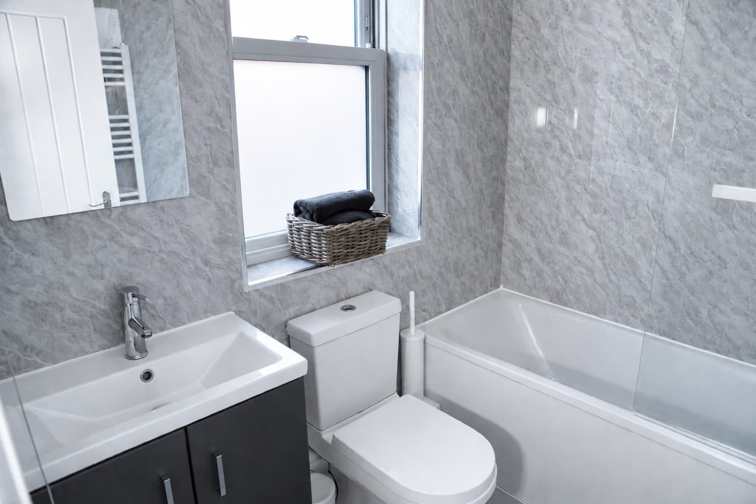 Second bathroom with bath and vanity