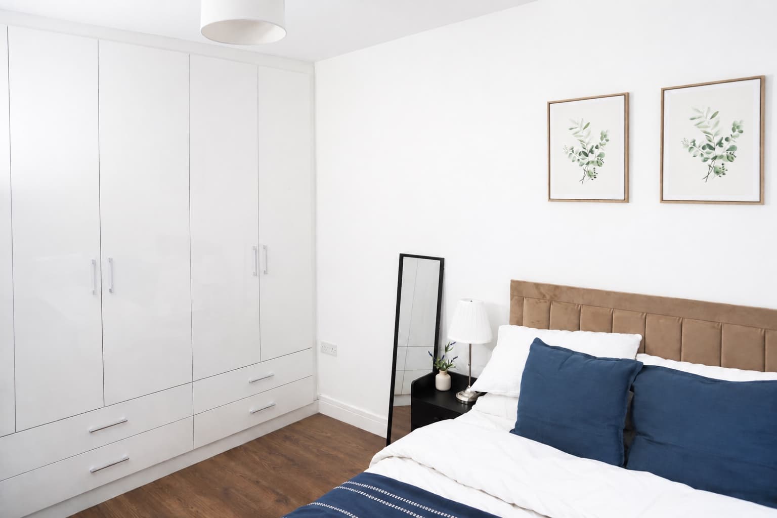 Bright double bedroom with fitted wardrobes
