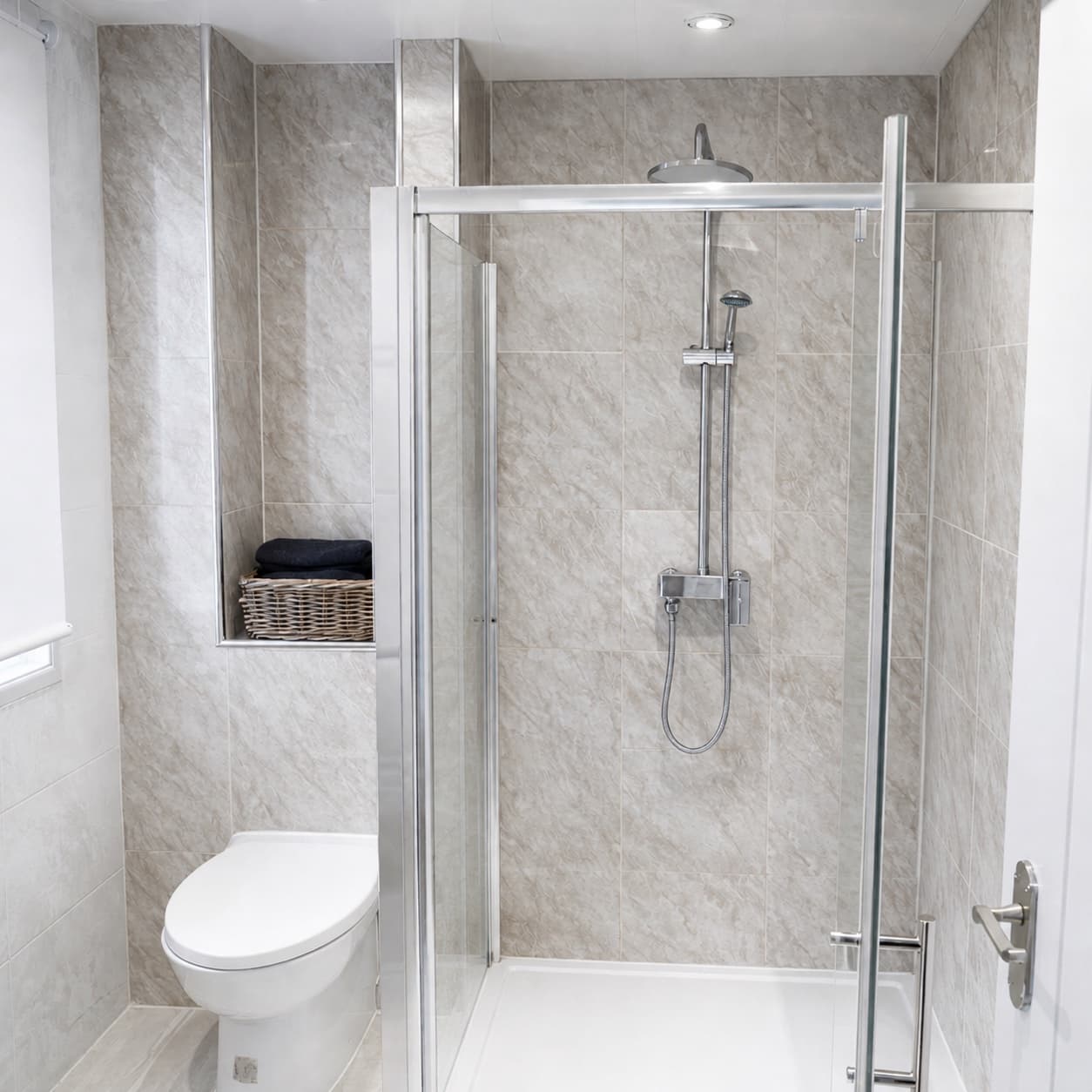 Tiled bathroom with walk-in shower